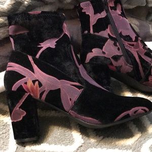 Black and purple velvet booties.